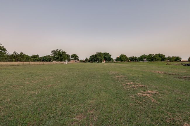 View of yard with a view of rural / pastoral area | Image 25