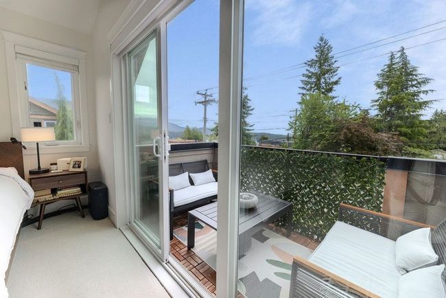 Primary bedroom balcony with ocean and mountain views | Image 22