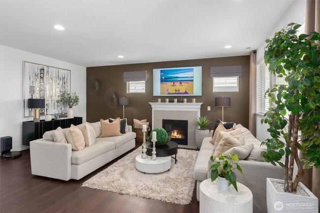 Whether hosting guests or enjoying a quiet evening at home, this thoughtfully designed great room provides a warm and welcoming ambiance for every occasion! | Image 5