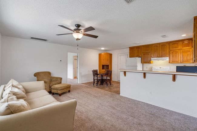 Apartment living and dining. | Image 25