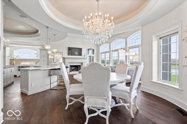 The kitchen also boasts a large, less formal dining area. | Image 20