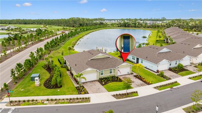 Aerial perspective of suburban area with a large body of water | Image 4
