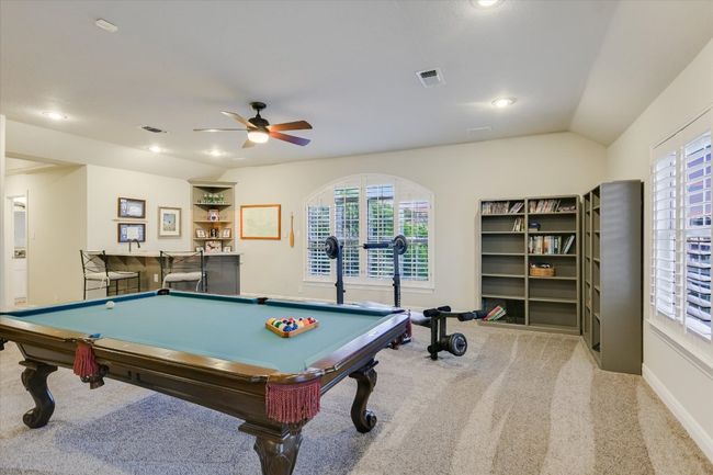 Recreation room featuring a wealth of natural light | Image 19