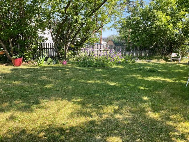 View of yard featuring fence | Image 25