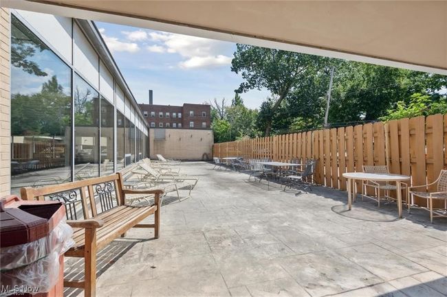 View of patio / terrace with fence and outdoor dining area | Image 8