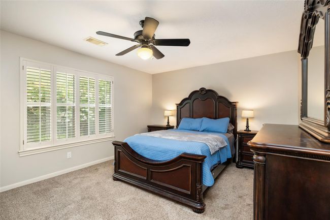 Another generously sized bedroom ensures no one has to compromise on space—there’s room here for comfort, creativity, and privacy. | Image 33