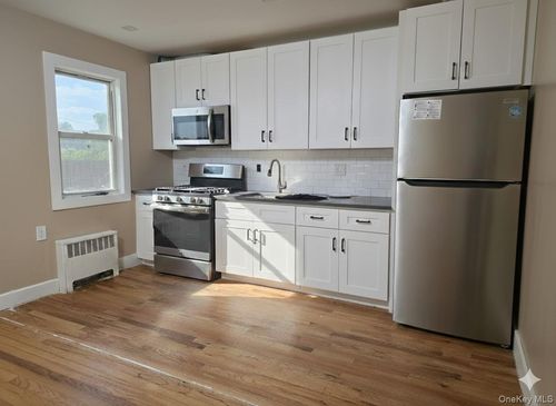 20202 109th Ave, Saint Albans, NY, 11412-1310 | Card Image