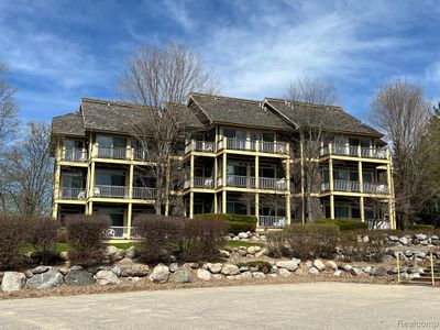 UNIT-2 - 5678 N. Crossover Drive, Condo with 2 bedrooms, 2 bathrooms and null parking in Kearney Twp MI | Image 1