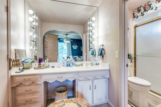 Full bathroom featuring ensuite bathroom, vanity, and a stall shower | Image 15