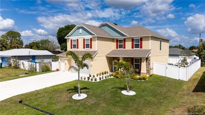 1033 Sw General Patton Terrace, House other with 6 bedrooms, 3 bathrooms and 3 parking in Port Saint Lucie FL | Image 2