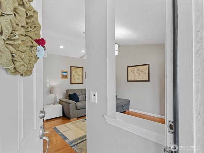 Enter the home into the inviting living room | Image 6