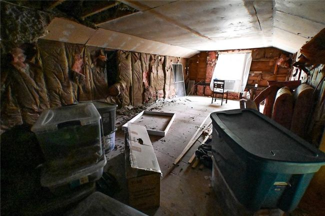 View of unfinished attic | Image 49