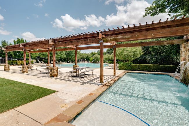 Community pool featuring a pergola and a patio | Image 28