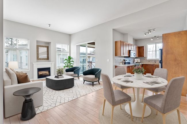 Great room featuring high 10 foot ceilings and designer paint throughout. | Image 9