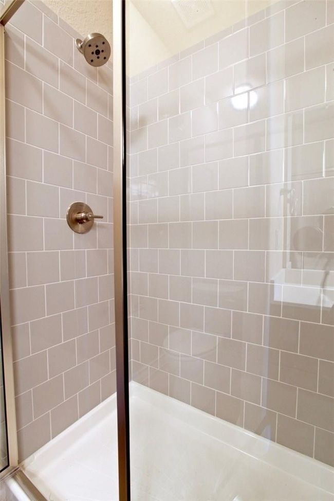 Full bath featuring a stall shower | Image 9
