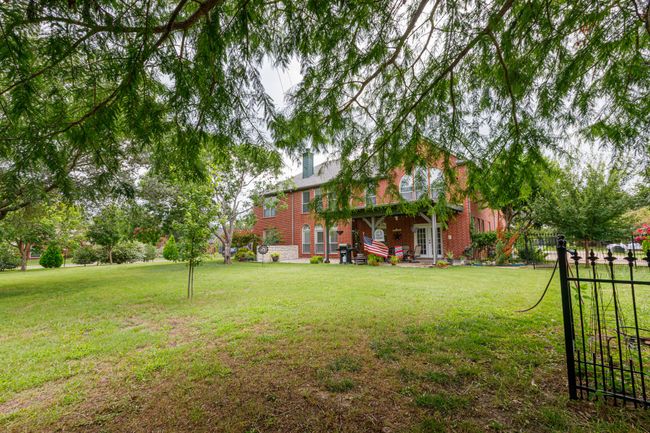 .49 acre corner lot, with room to run and play. Or add a POOL! | Image 34