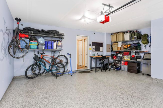 Notice all the storage and custom garage shelving | Image 26