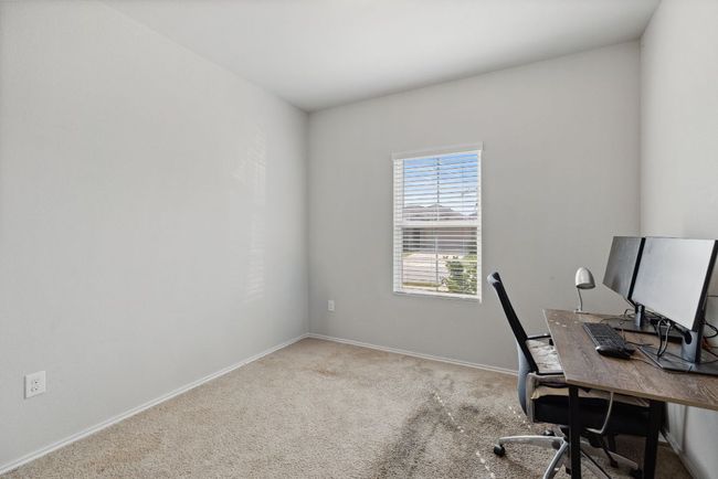 Office featuring carpet and baseboards | Image 9