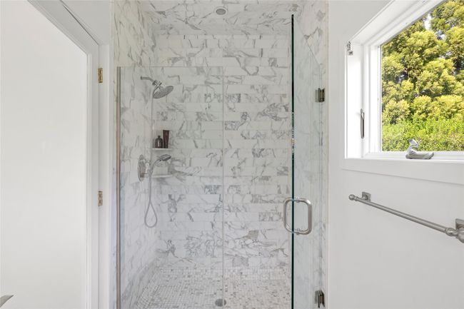 Bathroom featuring a marble finish shower | Image 20