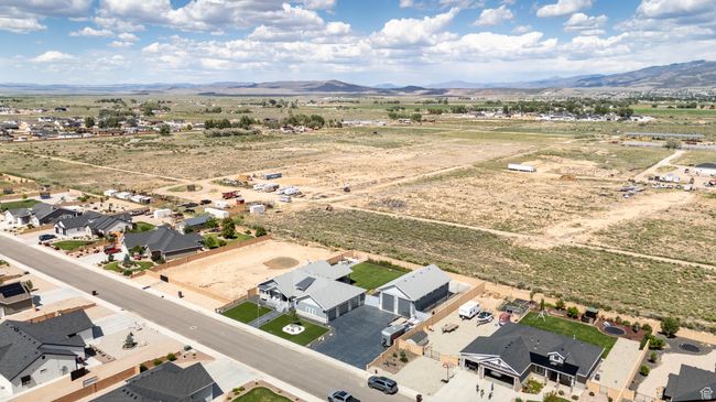 Aerial perspective of suburban area with mountains | Image 123