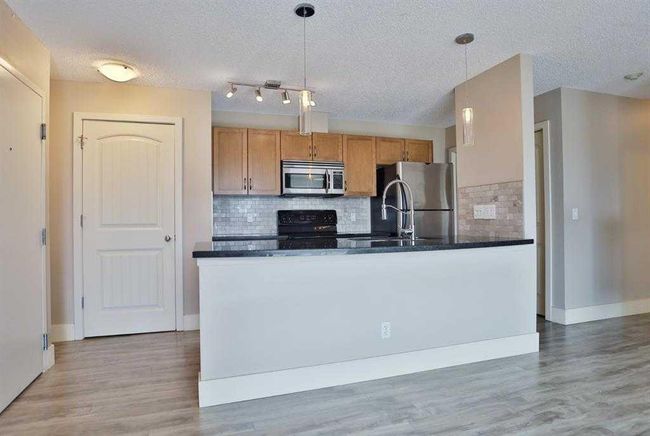 4 - 101 Village Heights Sw, Home with 2 bedrooms, 2 bathrooms and 1 parking in Calgary AB | Image 3