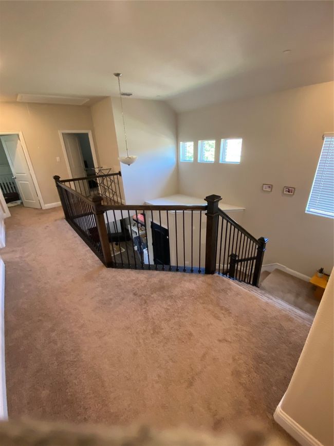 Stairs with carpet flooring | Image 19