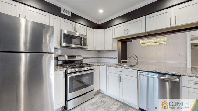 1 - 1401 Commons At Kingswood Dr, Townhouse with 2 bedrooms, 2 bathrooms and null parking in East Brunswick NJ | Image 5