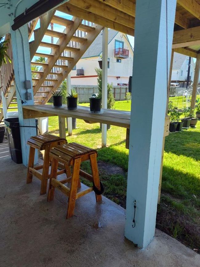 Eating area on bar; dart board also | Image 31