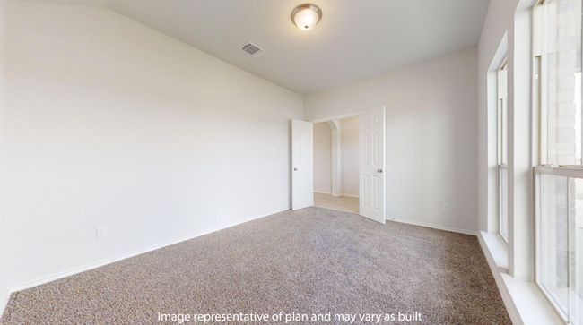 Unfurnished room with light colored carpet, lofted ceiling, and baseboards | Image 19