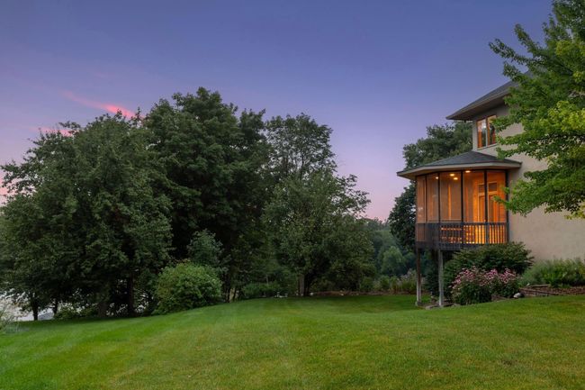 Enjoy evenings on the screen porch | Image 62