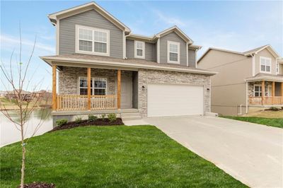 907 Sw Redbird Court, House other with 4 bedrooms, 2 bathrooms and null parking in Oak Grove MO | Image 1