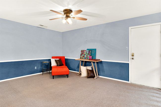 Family Room with carpet floors and ceiling fan | Image 26