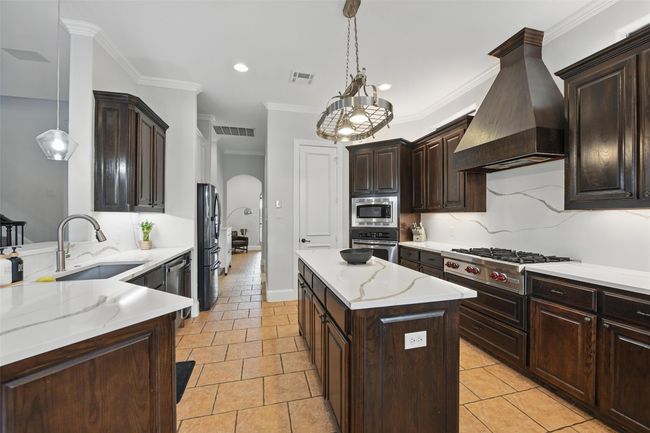 Lots of cabinet and prep space in this gorgeous kitchen! | Image 14
