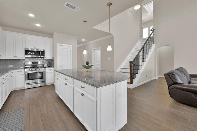 You'll never find yourself lacking for storage with the generous cabinet space. | Image 9