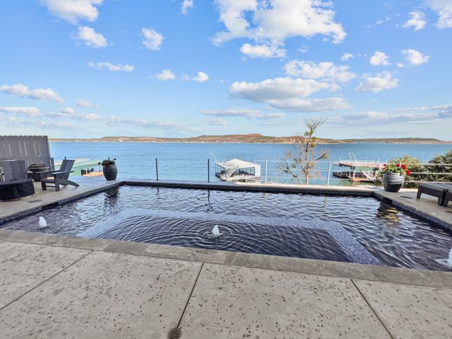 View of pool featuring a water view and a dock | Image 25