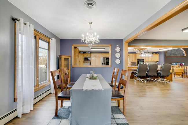 Entertaining a larger crowd? Plenty of room for a large crowd to dine, and space for another table in addition to the banquette seating in the kitchen. | Image 14