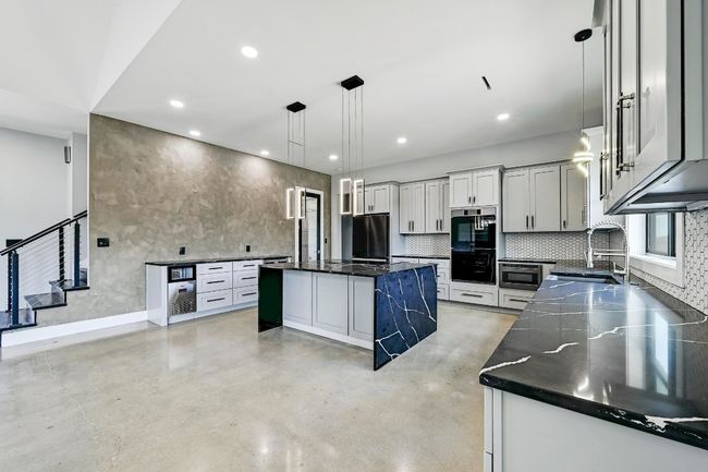 Featuring the modern gourmet chef's kitchen of your dreams with bespoke high-end finishes. | Image 4