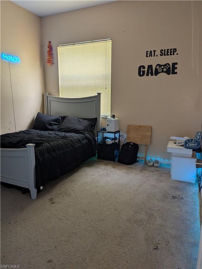View of carpeted bedroom | Image 19