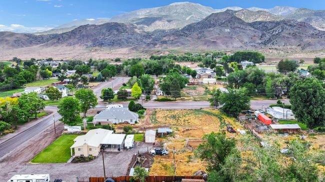 Aerial overview of property's location featuring a mountainous background | Image 31