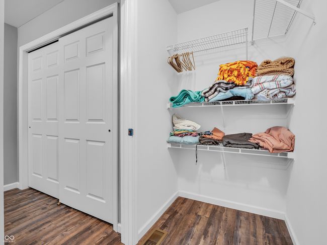 view of walk-in closet | Image 15