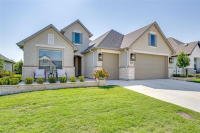 Front elevation changed dramatically after closing with addition of front patio and hardscape | Image 2