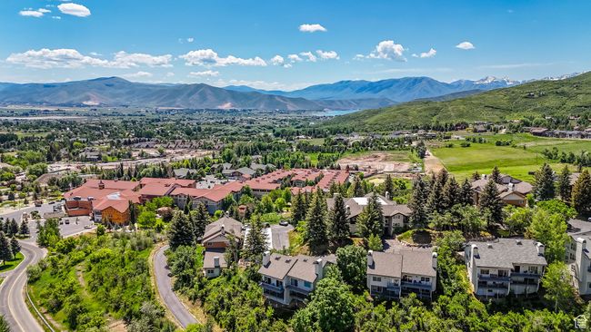 Aerial view of residential area featuring a mountainous background | Image 31