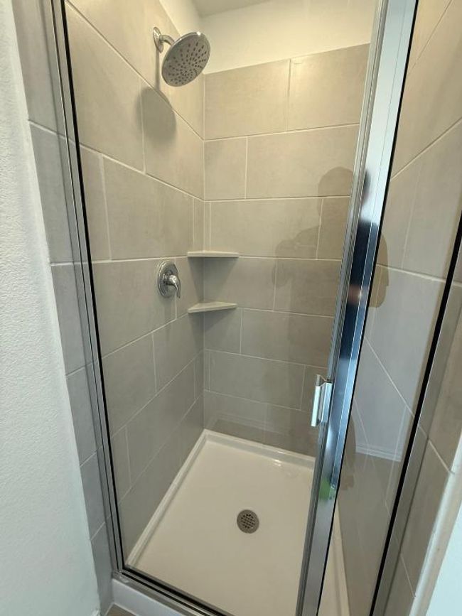 Bathroom with a shower stall | Image 29