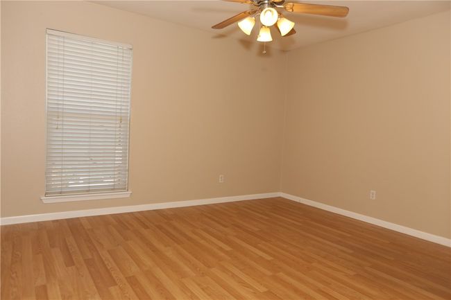 Large primary bedroom with ensuite bath and large master closet. | Image 9