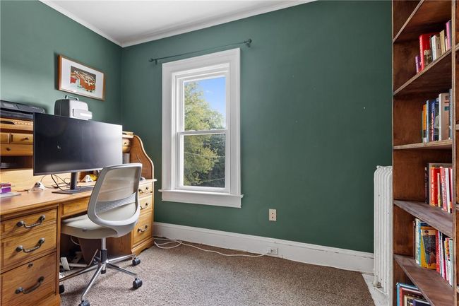 Bedroom 1 is currently being used as an office | Image 13