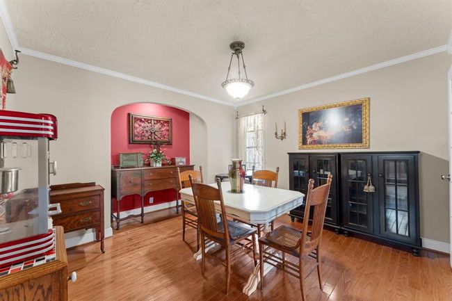 The dining room could easily be a study or fourth bedroom with easy access to the kitchen and living room | Image 8