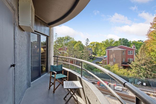 Lovely private balcony will have picturesque views of the trails and treetops once the construction wraps up! | Image 12