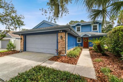 5032 Cypress Trace Drive, House other with 3 bedrooms, 2 bathrooms and null parking in TAMPA FL | Image 1