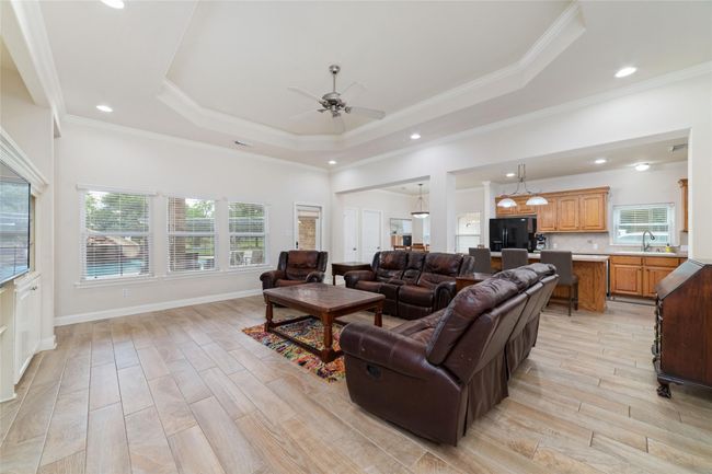 Nice-sized living room with built-ins. | Image 9