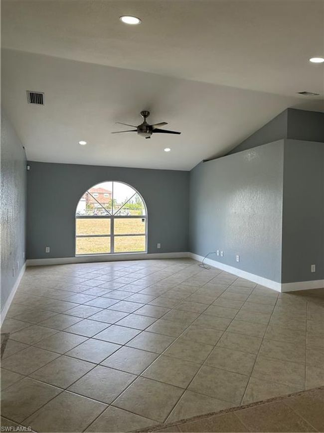 Spare room featuring a ceiling fan, recessed lighting, and tile patterned floors | Image 10
